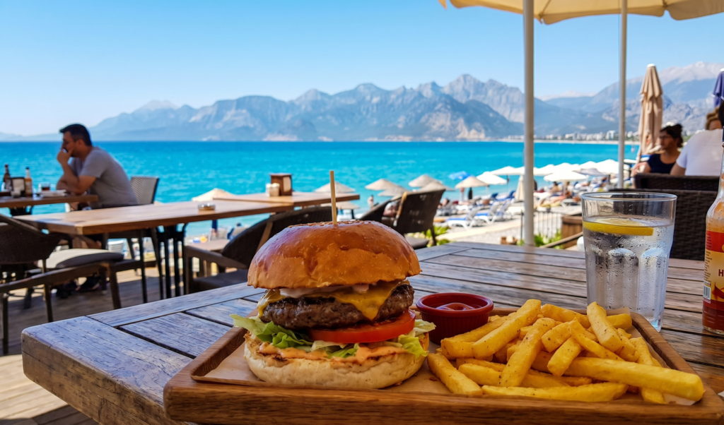 Delicious hamburger lunch at Konyaaltı Beach Park cafe Antalya Turkey with Mediterranean Sea view
