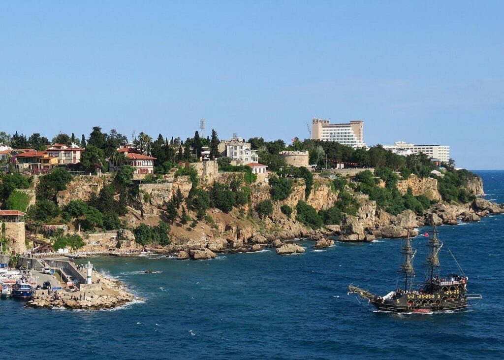 Boat tour along the turquoise Mediterranean coastline near Antalya Turkey with teenagers