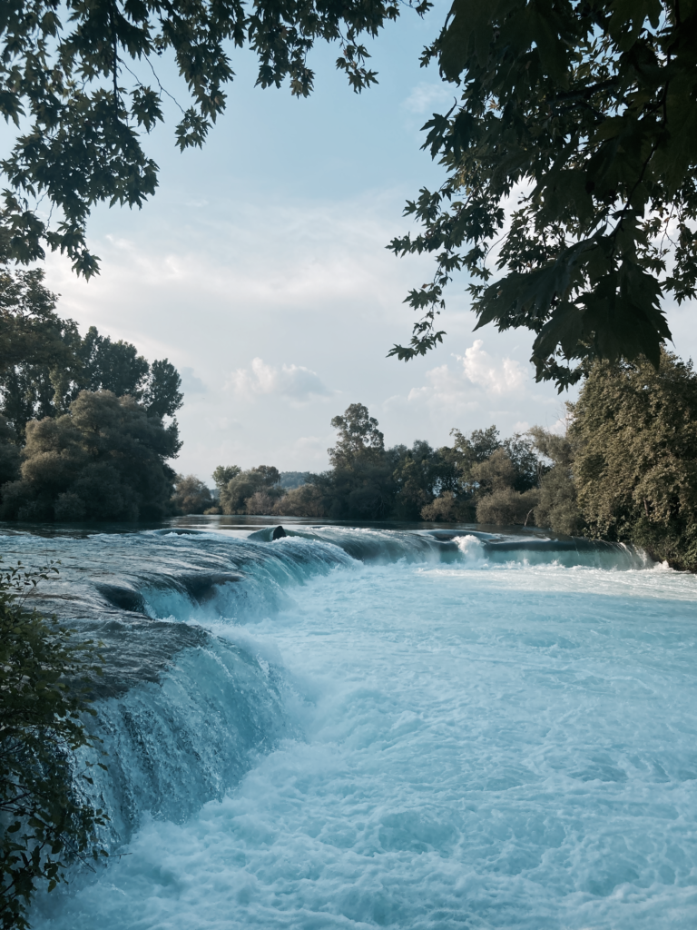 Manavgat Waterfall near Side, Turkey, surrounded by lush greenery