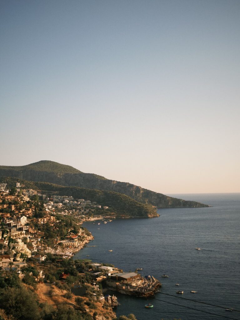 Serene view of the Mediterranean coastline near Kalkan at sunset