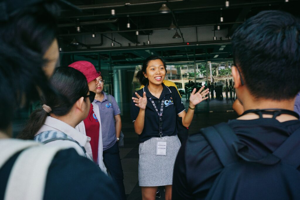Tour guide leading a group tour in an outdoor urban setting in Antalya