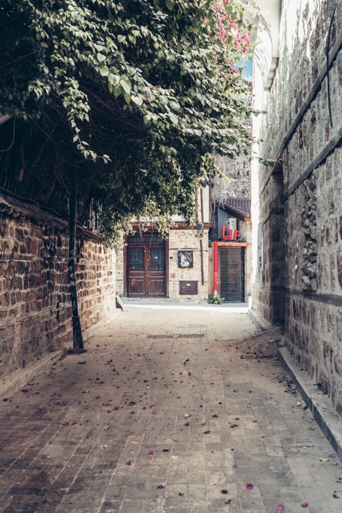 Charming historic alley in Antalya old town with stone walls