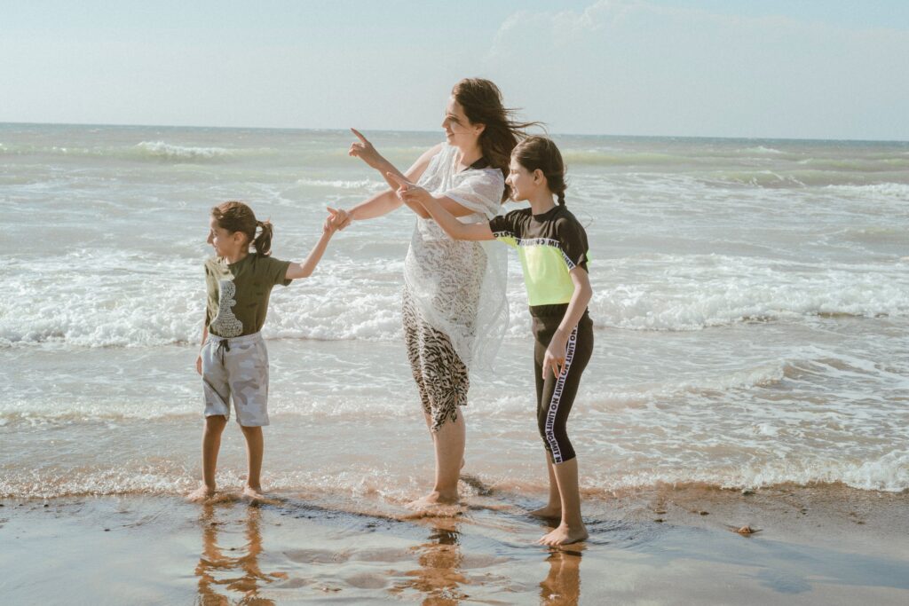 A mother and her children enjoying a sunny day at the beach in Turkey