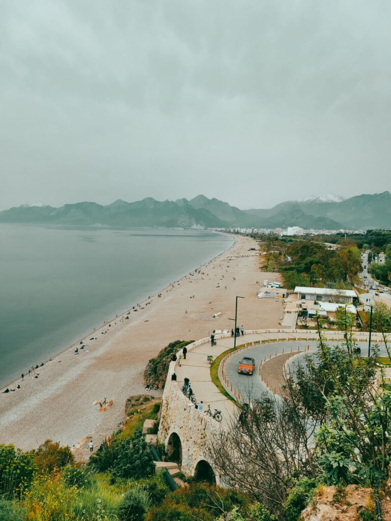 A stunning view of Antalya's coastline with mountains in the backdrop