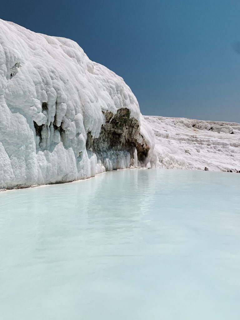 White travertine terraces and thermal pools of Pamukkale, Turkey