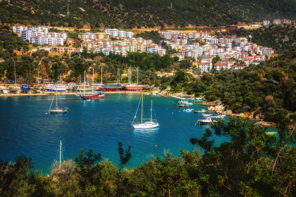 Aerial view of Kas harbor with yachts and Mediterranean coastline