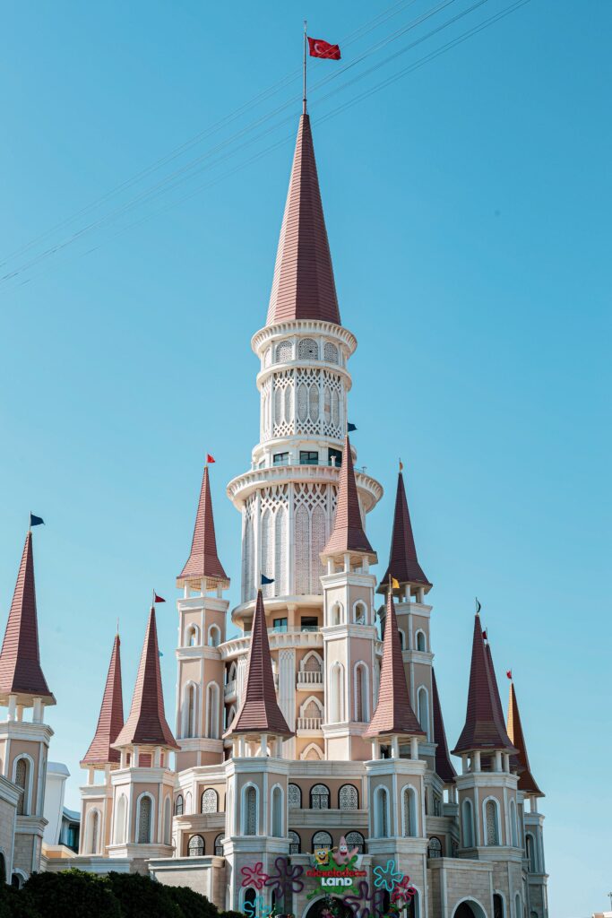 Fairytale castle theme park under blue skies in Belek, Antalya