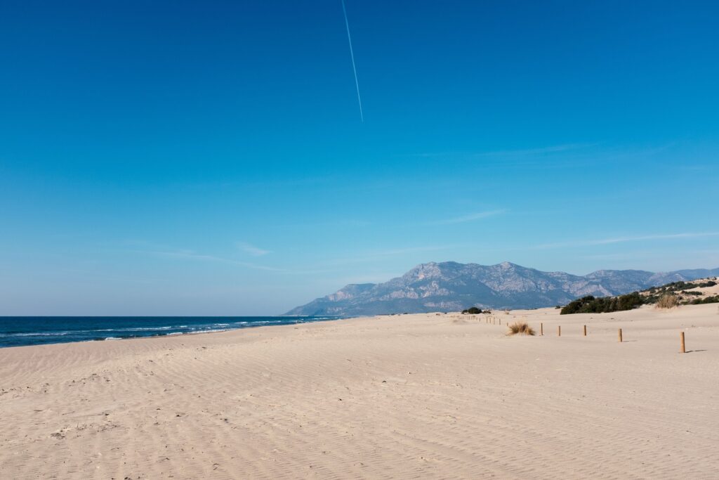 View of Patara Beach under a clear blue sky, Antalya, Turkey