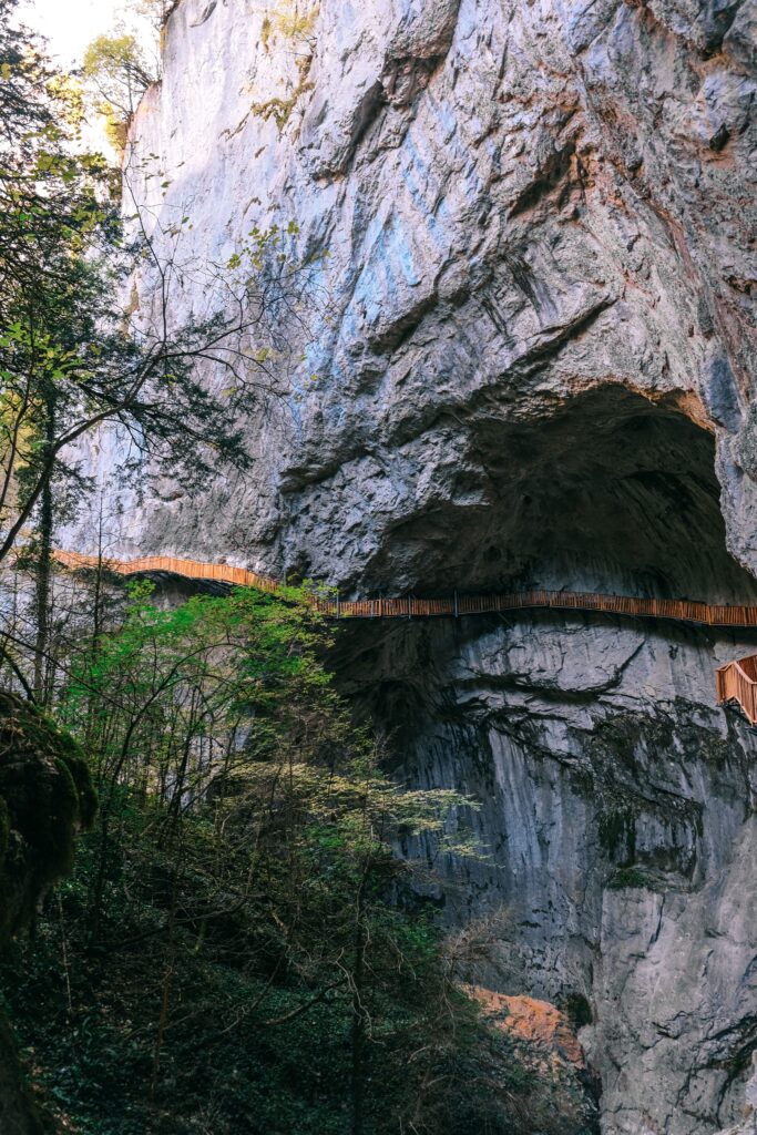 Wooden boardwalk crossing through a canyon in Turkey, similar to the walkway at Sapadere Canyon near Alanya