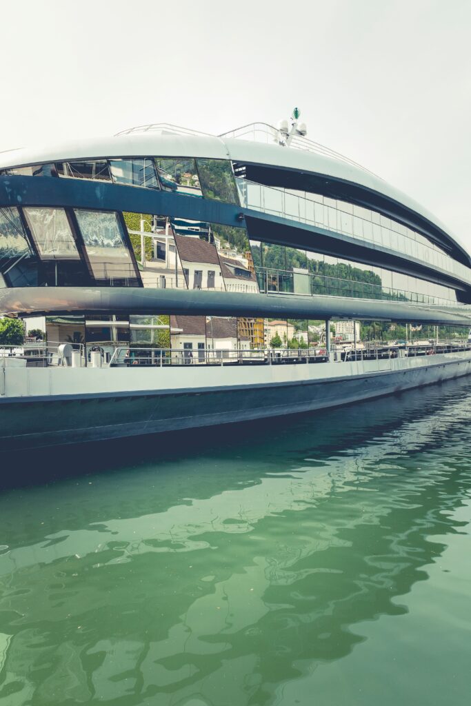 A cruise ship docked by the shore, similar to a call at Antalya's cruise port